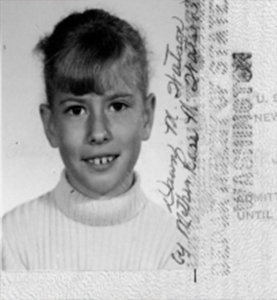 My first Passport photo, 9 years old and ready for adventure!