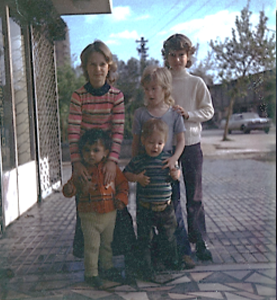 Vicky and I are in the back with Debbie and Donny, right front. Our apartment concierge’s son front left. This was the Cinarli on Ziyapasha  in Adana, 1973.